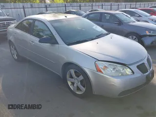 2006 Pontiac G6 GTP z VIN 1G2ZM551064133597, wystawiony jako IAAI lot #42383557 z przebiegiem 240 918 mil mil oraz . Historia ofert i sprzedaży dostępna na DreamBid. Obrazek 1.