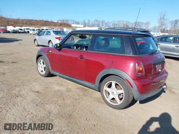 2009 MINI Cooper Hardtop with VIN WMWMF33509TU71339, listed as a IAAI auction lot 41777908 with 155,698 mi miles. Bid and sale history available at carsss.com. Image 3.