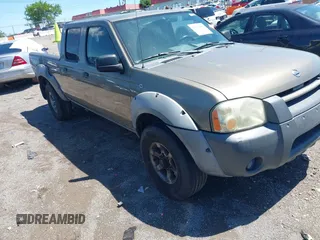 2002 Nissan Frontier XE z VIN 1N6ED29Y72C353512, wystawiony jako IAAI lot #42308461 z przebiegiem 190 875 mil mil oraz . Historia ofert i sprzedaży dostępna na DreamBid. Obrazek 1.