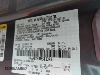 2021 Ford Mustang EcoBoost with VIN 1FA6P8TH9M5133781, listed as a IAAI auction lot 42158034 with 31,648 mi miles and . Bid and sale history available at DreamBid. Image 9.
