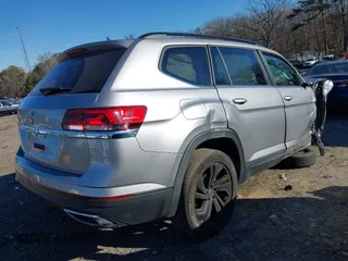 2022 Volkswagen Atlas SE z VIN 1V2JP2CA6NC502757, wystawiony jako IAAI lot #41247026 z przebiegiem 70 124 mil mil oraz . Historia ofert i sprzedaży dostępna na DreamBid. Obrazek 4.