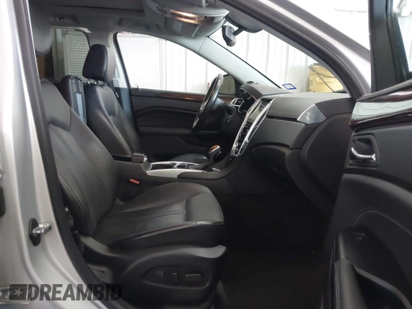 2013 Cadillac SRX Luxury Collection with VIN 3GYFNCE3XDS652987, listed as a IAAI auction lot 40955236 with 119,517 mi miles. Bid and sale history available at carsss.com. Image 5.
