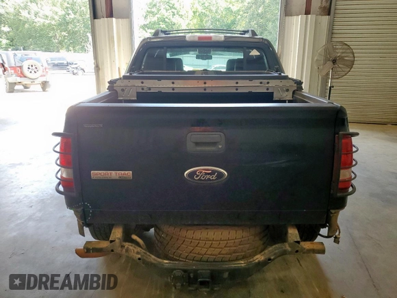 2010 Ford Explorer Sport Trac Limited с VIN 1FMEU3DE7AUA29311, выставлен на аукционе Copart как лот 65551435 с пробегом 183 700 миль миль и Списание • Salvage title. История ставок и продаж доступна на DreamBid. Изображение 6.