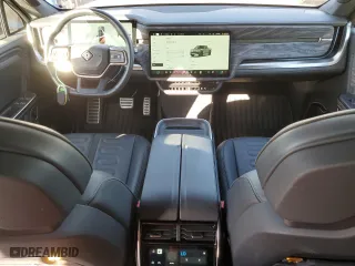 2022 Rivian R1T Launch Edition with VIN 7FCTGAAL3NN003101, listed as a Copart auction lot 85602634 with 17,189 mi miles and Salvage Title. Bid and sale history available at carsss.com. Image 8.