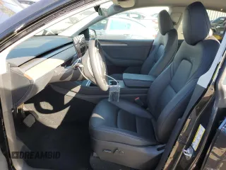 2024 Tesla Model Y Long Range z VIN 7SAYGAEE2RF009616, wystawiony jako Copart lot #46139805 z przebiegiem 6 535 mil mil oraz Szkoda całkowita • Salvage title. Historia ofert i sprzedaży dostępna na DreamBid. Obrazek 7.