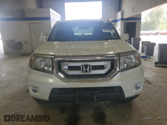 2011 Honda Pilot Touring z VIN 5FNYF3H91BB035074, wystawiony jako Copart lot #54789885 z przebiegiem 196 234 mil mil oraz Czysty tytuł • Clean title. Historia ofert i sprzedaży dostępna na DreamBid. Obrazek 5.