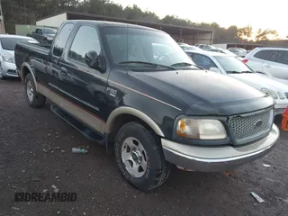 1999 Ford F-150 XL with VIN 1FTRX17L1XNB98741, listed as a IAAI auction lot 41113649 with 1 mi miles. Bid and sale history available at carsss.com. Image 1.