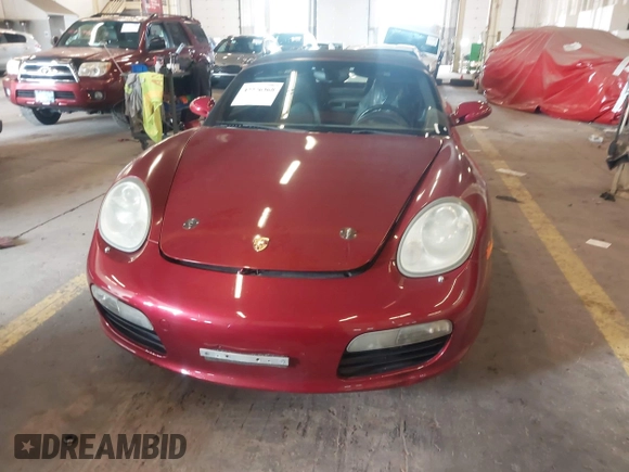 2006 Porsche Boxster z VIN WP0CA29806S710303, wystawiony jako IAAI lot #42276368 z przebiegiem 73 796 mil mil oraz . Historia ofert i sprzedaży dostępna na DreamBid. Obrazek 12.