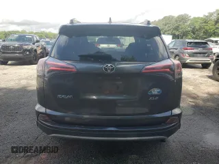 2018 Toyota RAV4 XLE with VIN JTMWFREV5JJ747297, listed as a Copart auction lot 56371505 with 215,598 mi miles and Clean Title. Bid and sale history available at DreamBid. Image 7.