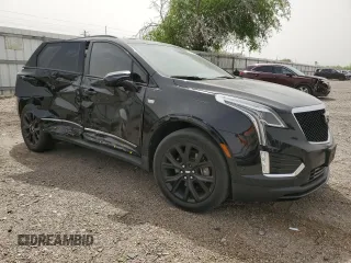 2020 Cadillac XT5 Sport AWD with VIN 1GYKNGRS7LZ189862, listed as a Copart auction lot 48987525 with 67,623 mi miles and Salvage title. Bid and sale history available at DreamBid. Image 4.
