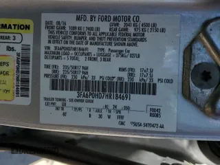 2017 Ford Fusion SE z VIN 3FA6P0HD7HR184691, wystawiony jako Copart lot #52515085 z przebiegiem 113 275 mil mil oraz Szkoda całkowita • Salvage title. Historia ofert i sprzedaży dostępna na DreamBid. Obrazek 15.