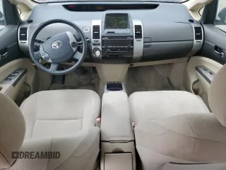 2005 Toyota Prius z VIN JTDKB20U253004140, wystawiony jako Copart lot #58275975 z przebiegiem 210 117 mil mil oraz Szkoda całkowita • Salvage title. Historia ofert i sprzedaży dostępna na DreamBid. Obrazek 8.