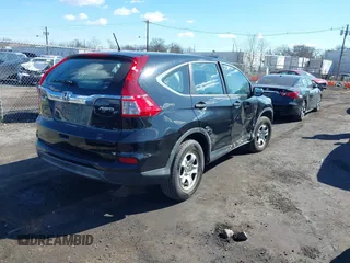 2016 Honda CR-V LX with VIN 5J6RM4H35GL009961, listed as a IAAI auction lot 41695675 with 68,201 mi miles. Bid and sale history available at carsss.com. Image 4.