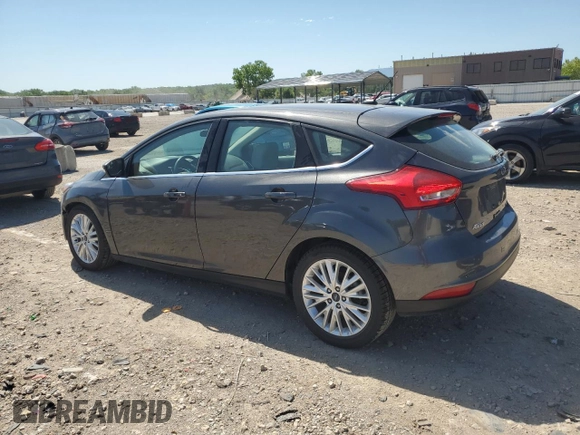 2017 Ford Focus Titanium с VIN 1FADP3N2XHL287713, выставлен на аукционе Copart как лот 57823155 с пробегом 51 828 миль миль и Списание • Salvage title. История ставок и продаж доступна на DreamBid. Изображение 2.