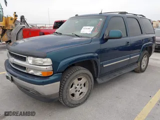 2005 Chevrolet Tahoe LT with VIN 1GNEC13T45R153791, listed as a IAAI auction lot 41553867 with 232,820 mi miles. Bid and sale history available at carsss.com. Image 2.