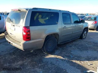 2007 Chevrolet Suburban LS with VIN 1GNFC16037J337224, listed as a IAAI auction lot 41297347 with 256,162 mi miles. Bid and sale history available at carsss.com. Image 4.