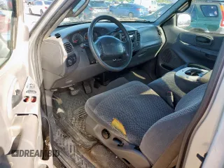 2000 Ford F-150 XL с VIN 1FTRX17L6YKB45245, выставлен на аукционе Copart как лот 62365195 с пробегом 306 210 миль миль и Списание • Salvage title. История ставок и продаж доступна на DreamBid. Изображение 8.