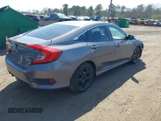 2019 Honda Civic Sport with VIN 19XFC2F88KE208342, listed as a IAAI auction lot 42062837 with 46,475 mi miles and . Bid and sale history available at DreamBid. Image 4.