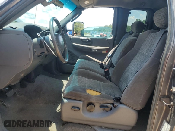 2002 Ford F-150 XL z VIN 1FTRX18L52NB59531, wystawiony jako Copart lot #58550365 z przebiegiem 267 424 mil mil oraz Szkoda całkowita • Salvage title. Historia ofert i sprzedaży dostępna na DreamBid. Obrazek 7.