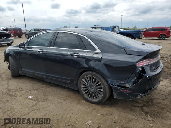 2014 Lincoln MKZ z VIN 3LN6L2GK5ER826026, wystawiony jako Copart lot #58941095 z przebiegiem 130 761 mil mil oraz Czysty tytuł • Clean title. Historia ofert i sprzedaży dostępna na DreamBid. Obrazek 2.