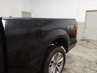2018 Ford F-150 XL with VIN 1FTEX1EP1JKE74560, listed as a IAAI auction lot 41531539 with 54,558 mi miles and . Bid and sale history available at DreamBid. Image 21.