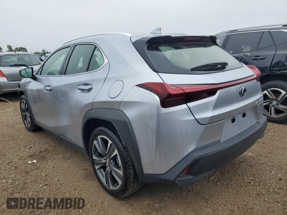 2025 Lexus UX with VIN JTHUCJDH3S2001129, listed as a Copart auction lot 65140554 with 875 mi miles and Salvage Title. Bid and sale history available at carsss.com. Image 2.