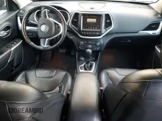 2018 Jeep Cherokee Overland with VIN 1C4PJMJX8JD562138, listed as a Copart auction lot 77249404 with 119,865 mi miles and Salvage Title. Bid and sale history available at carsss.com. Image 8.