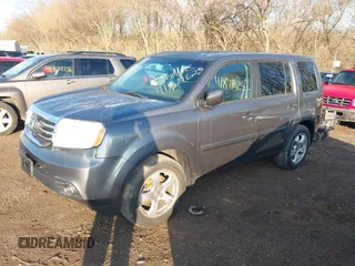 2012 Honda Pilot EX-L with VIN 5FNYF4H52CB034259, listed as a IAAI auction lot 41871625 with 159,577 mi miles and . Bid and sale history available at carsss.com. Image 17.