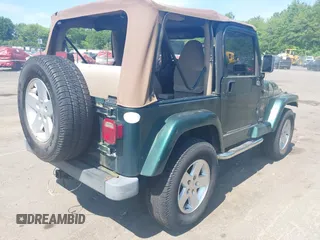 2000 Jeep Wrangler Sahara с VIN 1J4FA59S0YP748057, выставлен на аукционе IAAI как лот 42420342 с пробегом 195 963 миль миль и . История ставок и продаж доступна на DreamBid. Изображение 4.
