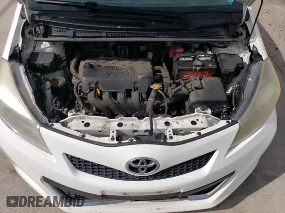 2012 Toyota Yaris L z VIN JTDKTUD3XCD528749, wystawiony jako Copart lot #56803205 z przebiegiem 140 024 mil mil oraz Szkoda całkowita • Salvage title. Historia ofert i sprzedaży dostępna na DreamBid. Obrazek 11.