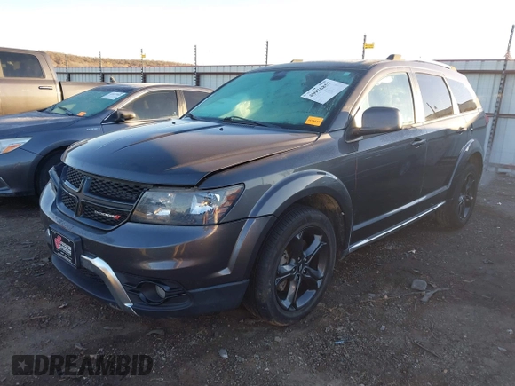 2018 Dodge Journey Crossroad with VIN 3C4PDDGGXJT386542, listed as a IAAI auction lot 40976857 with 147,853 mi miles and . Bid and sale history available at DreamBid. Image 2.