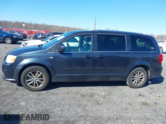 2014 Dodge Grand Caravan SXT with VIN 2C4RDGCG3ER339491, listed as a IAAI auction lot 41744826 with 146,757 mi miles and . Bid and sale history available at DreamBid. Image 14.