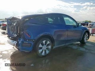 2022 Tesla Model Y Long Range z VIN 7SAYGDEEXNF372693, wystawiony jako Copart lot #53275555 z przebiegiem 51 165 mil mil oraz Szkody całkowita. Historia ofert i sprzedaży dostępna na DreamBid. Obrazek 3.