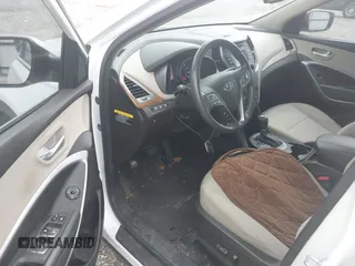 2016 Hyundai Santa Fe z VIN 5XYZU3LB0GG345673, wystawiony jako IAAI lot #42290297 z przebiegiem 75 701 mil mil oraz . Historia ofert i sprzedaży dostępna na DreamBid. Obrazek 18.