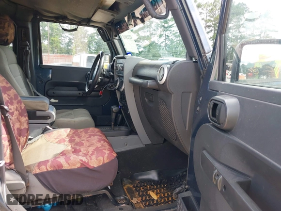 2008 Jeep Wrangler Unlimited Sahara with VIN 1J4GA591X8L520621, listed as a IAAI auction lot 42525613 with 184,239 mi miles and . Bid and sale history available at DreamBid. Image 5.
