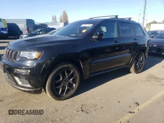 2019 Jeep Grand Cherokee Limited X with VIN 1C4RJFBT0KC576784, listed as a Copart auction lot 82621404 with 84,512 mi miles and Salvage title. Bid and sale history available at DreamBid. Image 1.