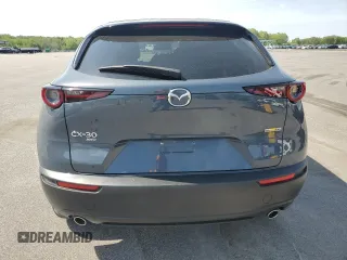2024 Mazda CX-30 S Carbon Edition z VIN 3MVDMBCM1RM659830, wystawiony jako Copart lot #56556985 z przebiegiem 20 048 mil mil oraz Szkoda całkowita • Salvage title. Historia ofert i sprzedaży dostępna na DreamBid. Obrazek 6.