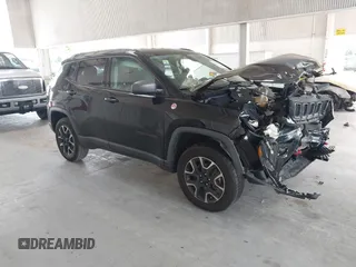 2020 Jeep Compass Trailhawk z VIN 3C4NJDDB3LT170463, wystawiony jako IAAI lot #42446080 z przebiegiem 83 336 mil mil oraz . Historia ofert i sprzedaży dostępna na DreamBid. Obrazek 1.