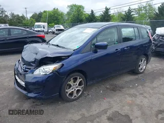 2010 Mazda 5 Sport with VIN JM1CR2W31A0364476, listed as a IAAI auction lot 42220961 with 177,885 mi miles and . Bid and sale history available at DreamBid. Image 17.
