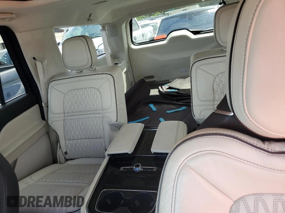 2020 Lincoln Navigator Black Label z VIN 5LMJJ3TT4LEL21595, wystawiony jako Copart lot #73951494 z przebiegiem Nie podano mil oraz Szkoda całkowita • Salvage title. Historia ofert i sprzedaży dostępna na DreamBid. Obrazek 10.