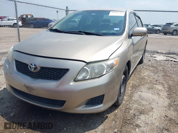 2009 Toyota Corolla with VIN 1NXBU40E69Z002692, listed as a IAAI auction lot 41942713 with 127,609 mi miles. Bid and sale history available at carsss.com. Image 2.