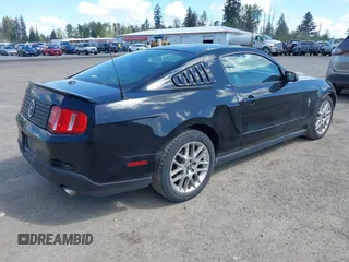 2012 Ford Mustang V6 Premium with VIN 1ZVBP8AM5C5251864, listed as a IAAI auction lot 42087587 with 171,417 mi miles. Bid and sale history available at carsss.com. Image 4.
