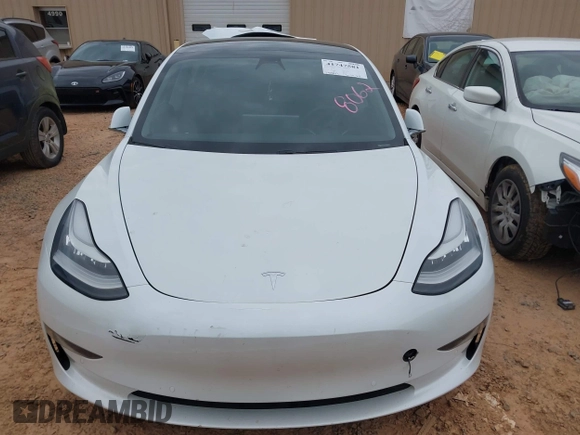 2020 Tesla Model 3 Standard Range Plus with VIN 5YJ3E1EA1LF738062, listed as a IAAI auction lot 41747581 with 41,897 mi miles. Bid and sale history available at carsss.com. Image 11.