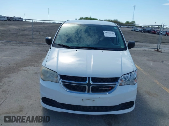 2014 Dodge Grand Caravan American Value with VIN 2C4RDGBG8ER140342, listed as a IAAI auction lot 42198306 with 135,564 mi miles and . Bid and sale history available at DreamBid. Image 6.