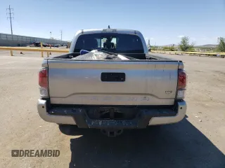 2022 Toyota Tacoma SR with VIN 3TMCZ5AN4NM470997, listed as a Copart auction lot 55165855 with 67,161 mi miles and Salvage title. Bid and sale history available at DreamBid. Image 6.