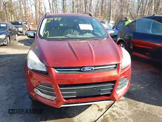 2014 Ford Escape SE with VIN 1FMCU9GX1EUE23044, listed as a IAAI auction lot 41597818 with 165,348 mi miles. Bid and sale history available at carsss.com. Image 11.