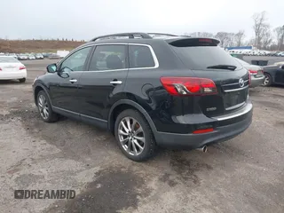 2015 Mazda CX-9 Grand Touring z VIN JM3TB3DV6F0464926, wystawiony jako IAAI lot #42035670 z przebiegiem 168 257 mil mil oraz . Historia ofert i sprzedaży dostępna na DreamBid. Obrazek 3.