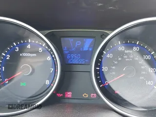 2010 Hyundai Tucson GLS with VIN KM8JT3AC1AU097317, listed as a IAAI auction lot 41758296 with 108,695 mi miles and . Bid and sale history available at DreamBid. Image 7.