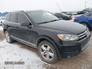 2014 Volkswagen Touareg Sport с VIN WVGEP9BP6ED014271, выставлен на аукционе IAAI как лот 41108975 с пробегом 121 440 миль миль и . История ставок и продаж доступна на DreamBid. Изображение 1.