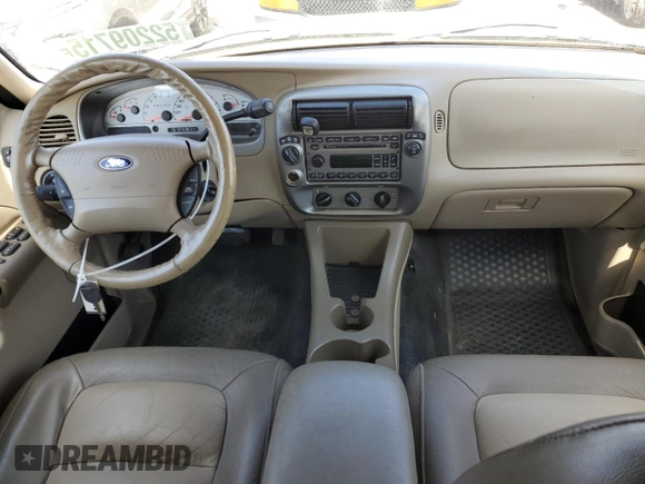 2005 Ford Explorer Sport Trac XLS with VIN 1FMDU77K35UA00852, listed as a Copart auction lot 52209715 with 247,583 mi miles and Salvage title. Bid and sale history available at DreamBid. Image 8.